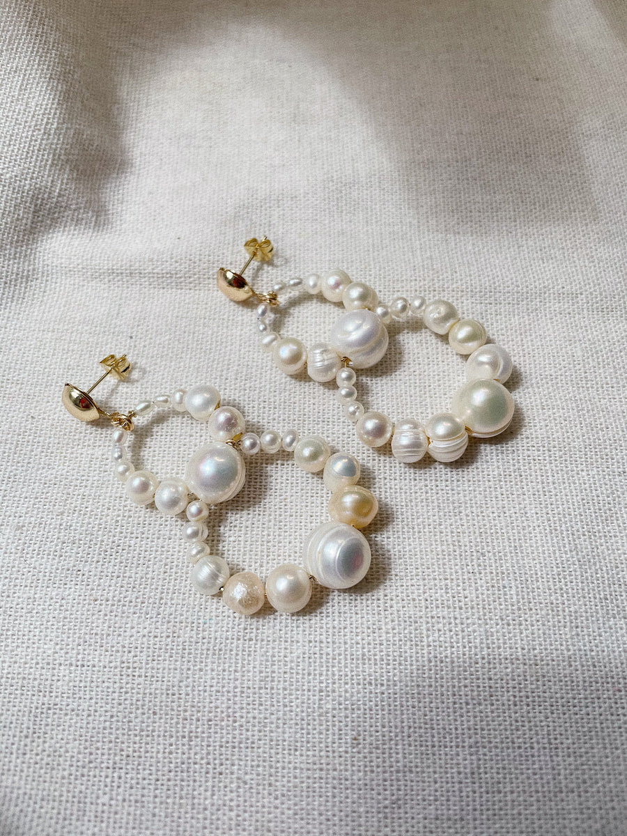 BECCA OVERLAPPING PEARL EARRING